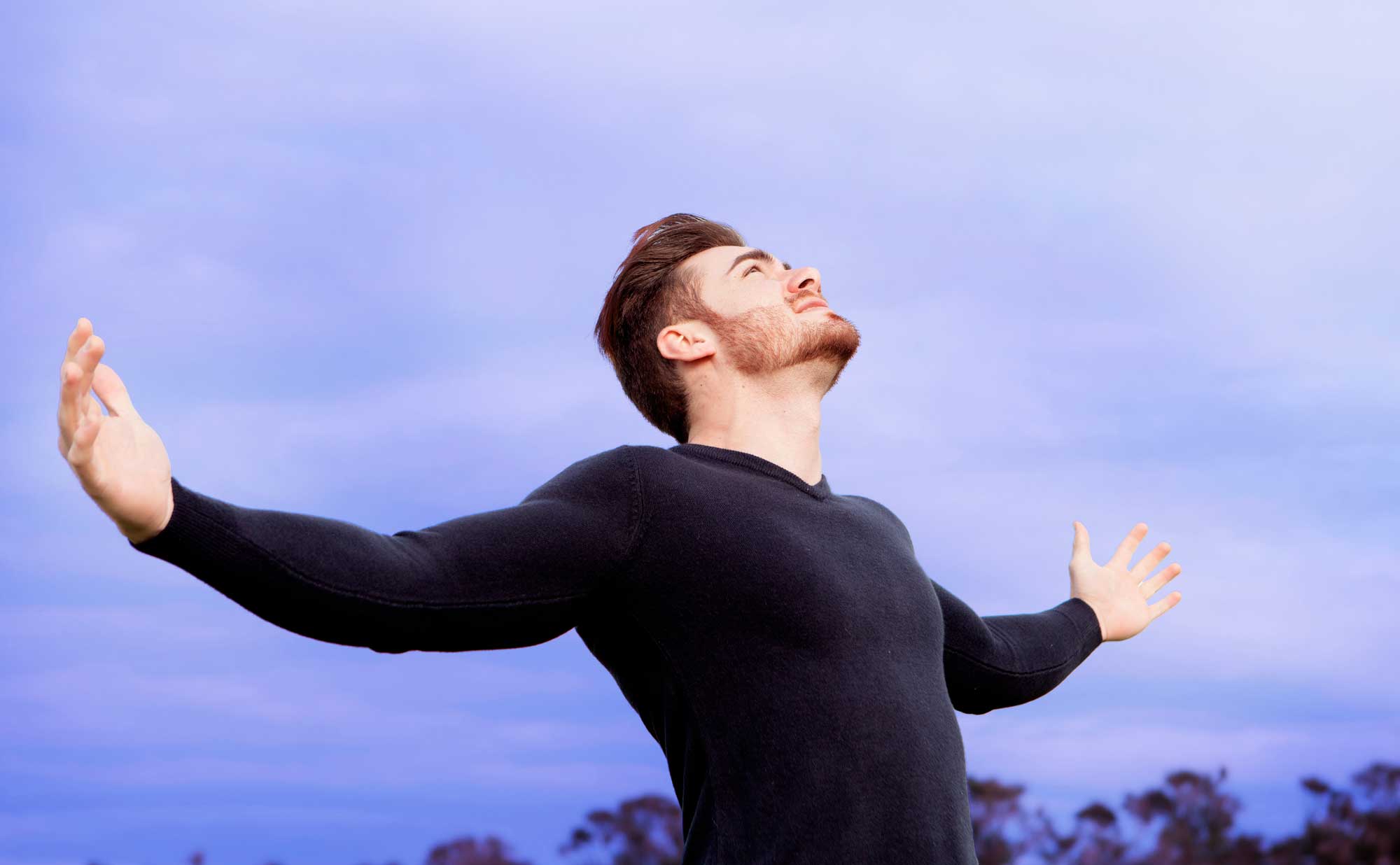 Man-Standing-in-Sunlight-Happy-web-2